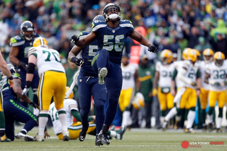 Jan 18, 2015; Seattle, WA, USA; Seattle Seahawks defensive end Cliff Avril (56) celebrates after a third quarter sack against the Green Bay Packers in the NFC Championship game at CenturyLink Field. Mandatory Credit: Joe Nicholson-USA TODAY Sports
